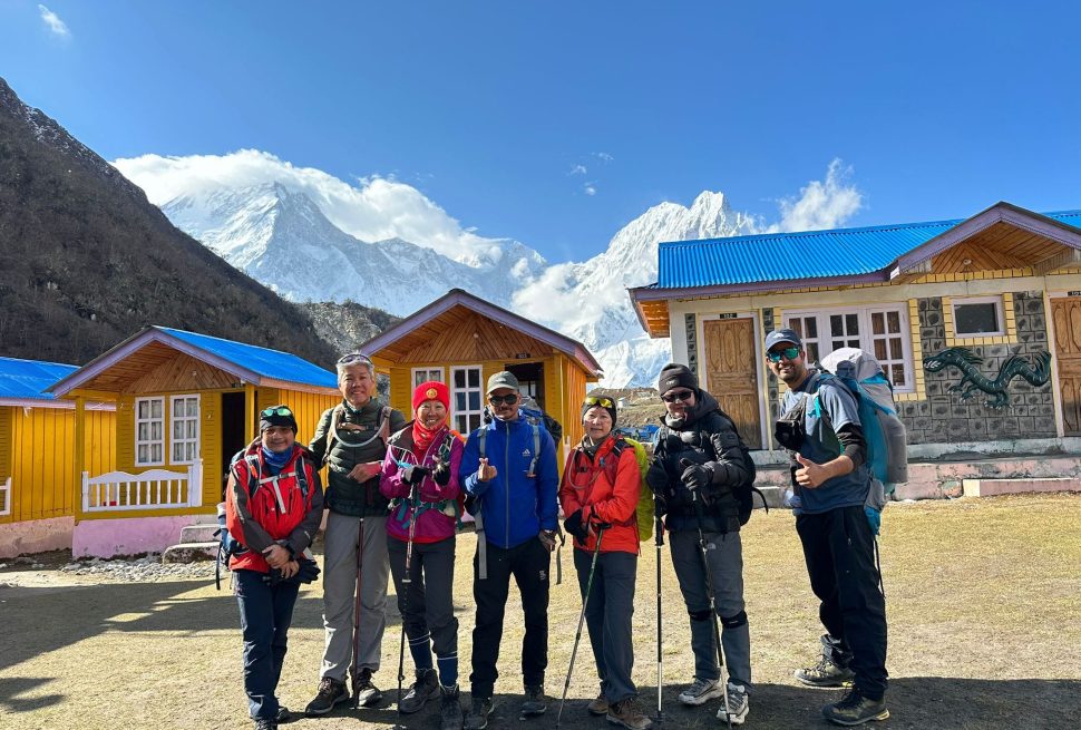 Trekkers starting their day after Larkya pass in Manaslu