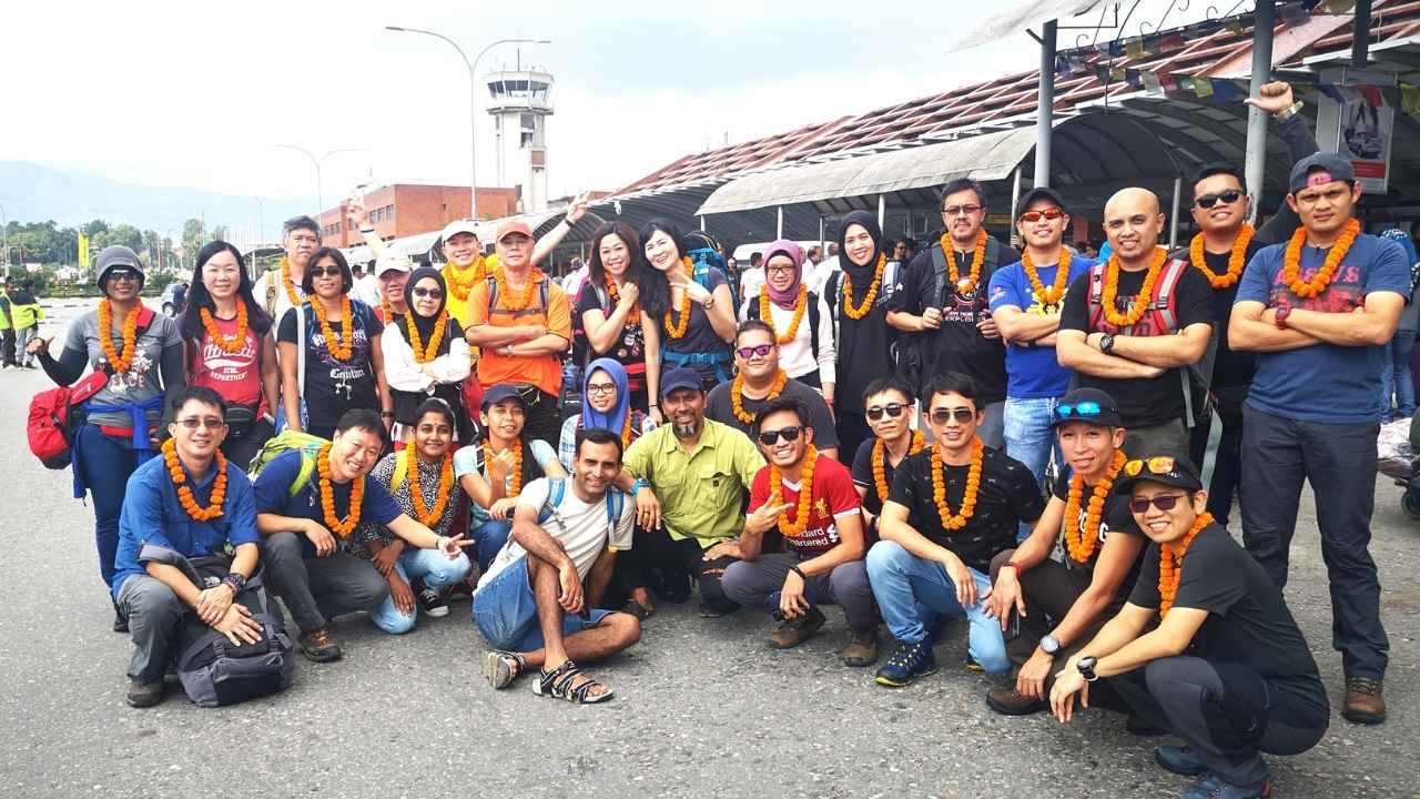 Group of Everest Base Camp trekkers welcomed with flower garlands at Kathmandu Airport