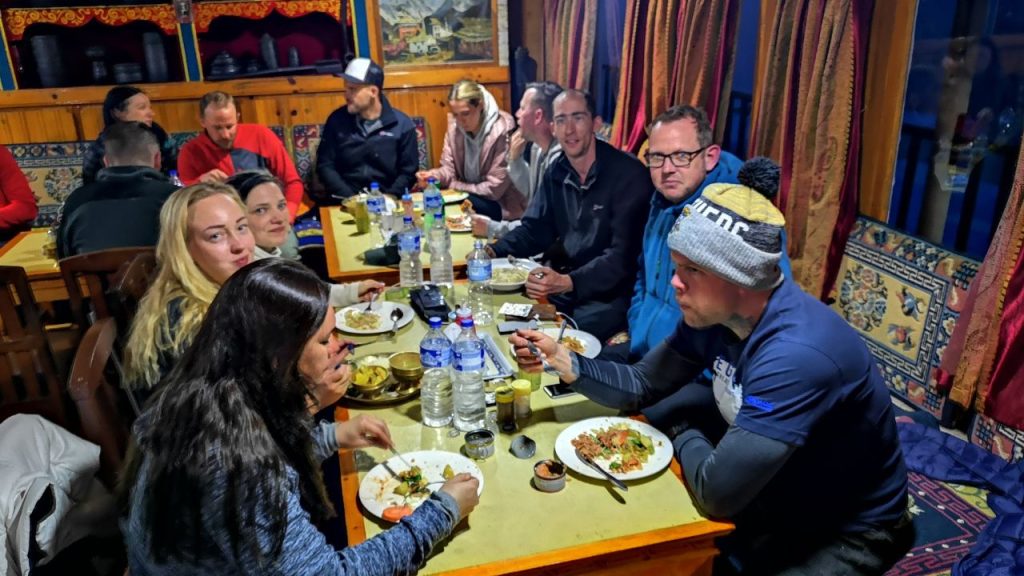 Trekkers having dinner at a teahouse on the Everest Base Camp Trek